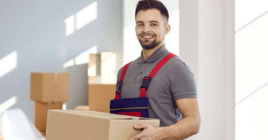 A mover in Chandler smiling during a move.