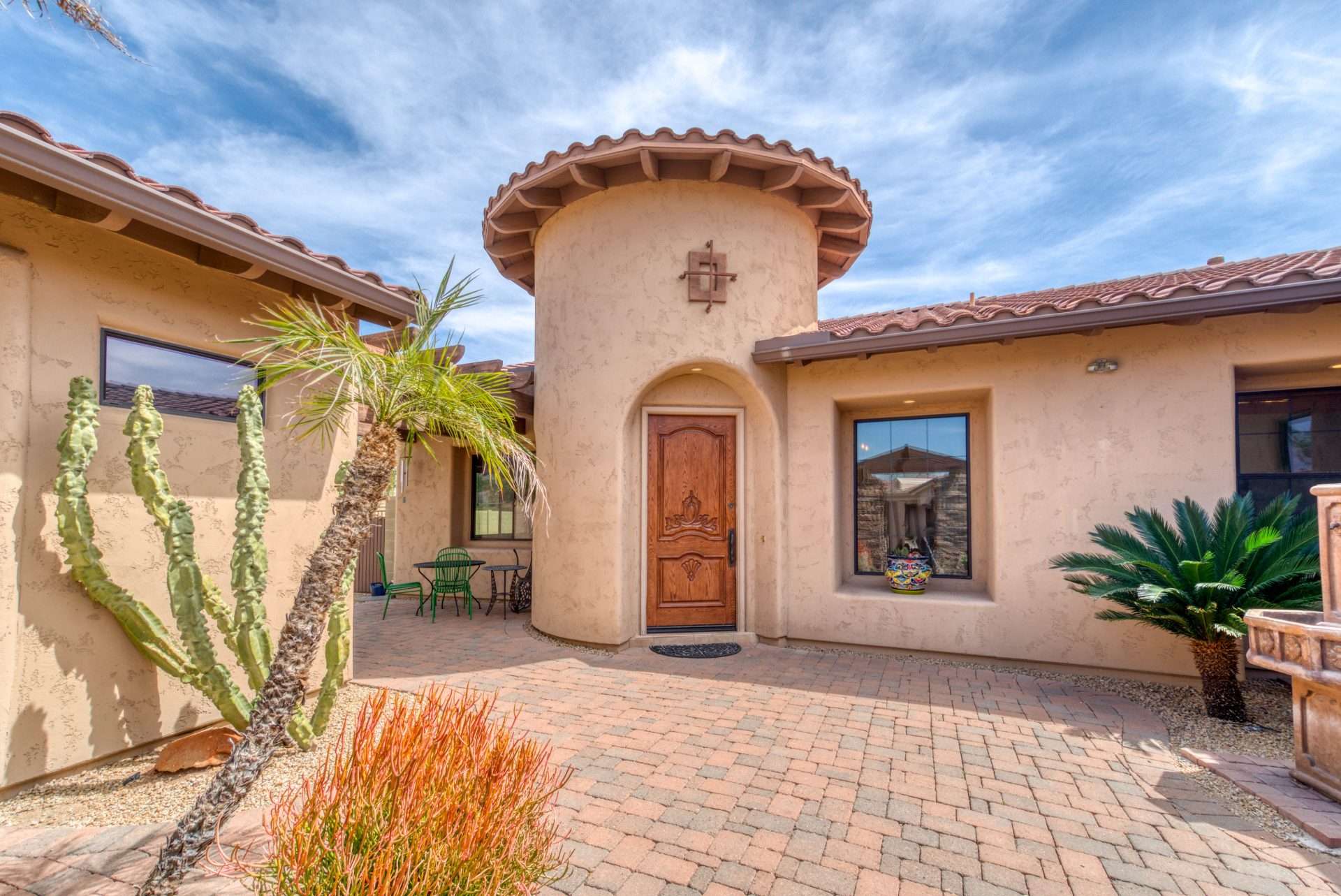Southwestern-style home exterior in Phoenix, Arizona. Muscular Moving Men is here to help with Phoenix packout services when disaster strikes.
