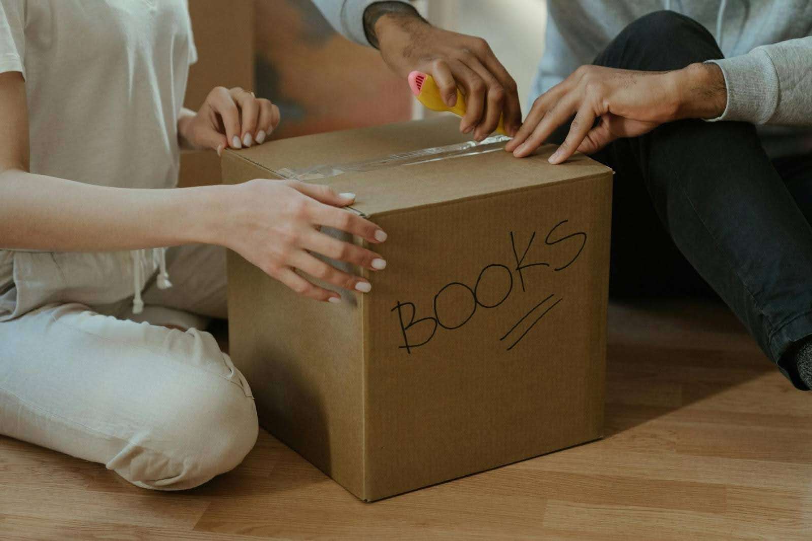 Opening a box with a box cutter