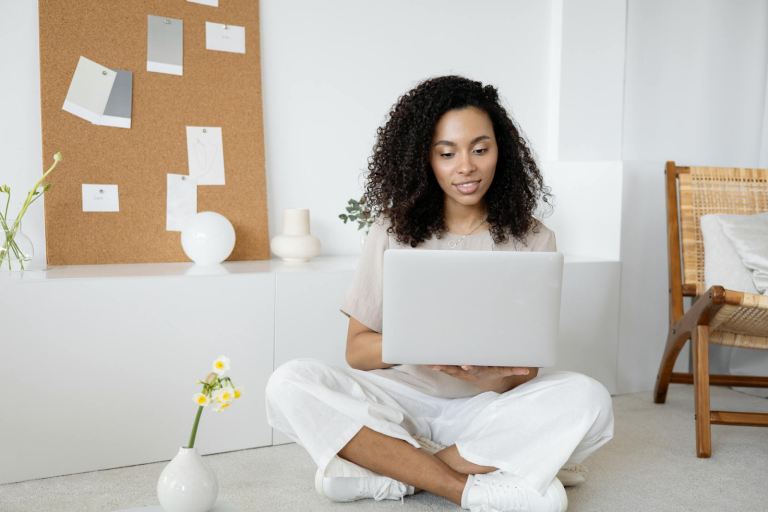 Looking at a computer, reading reviews