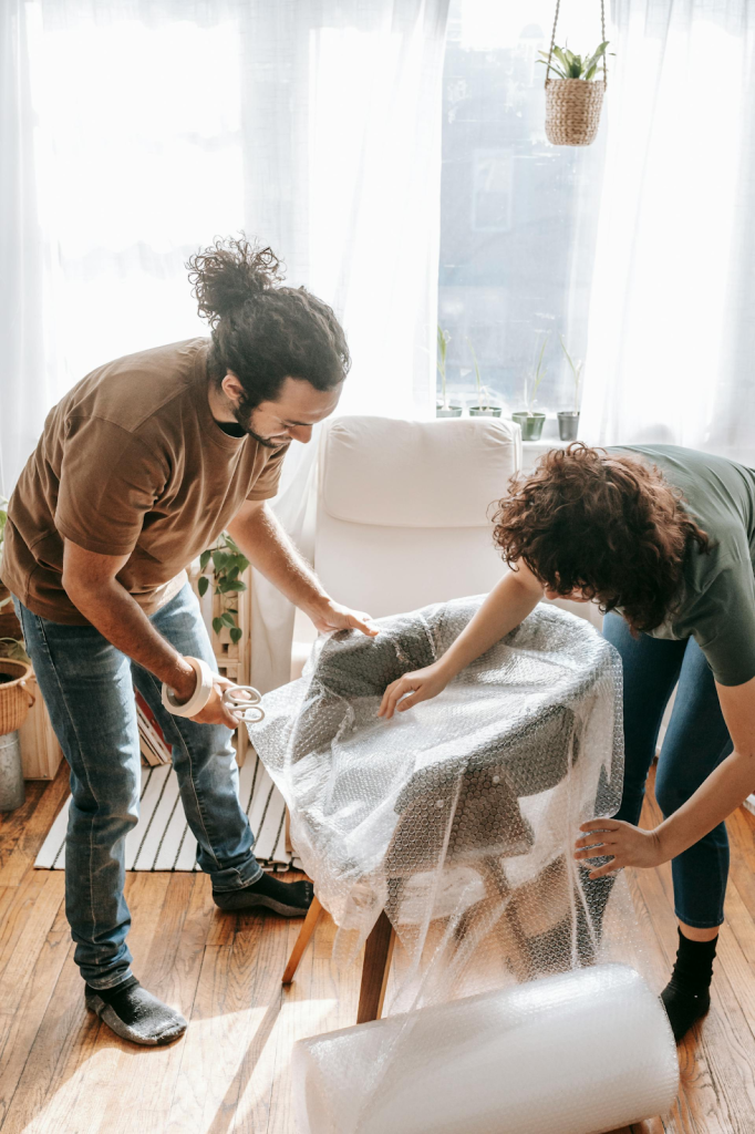 Packing a chair with bubble wrap