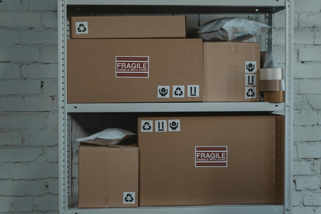 Boxes on a metal shelf